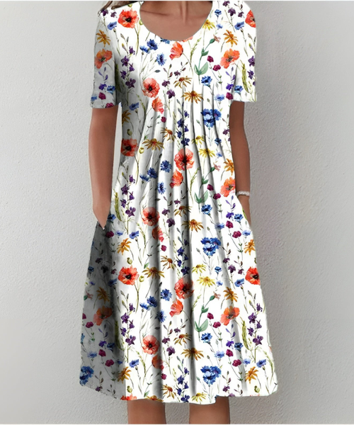 שמלצת פרחים אלמה בלומסטרקוג™ | שמלת קיץ אלגנטית וקלה עם דפוסי פרחים צבעוניים