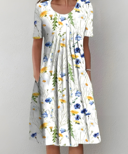 שמלצת פרחים אלמה בלומסטרקוג™ | שמלת קיץ אלגנטית וקלה עם דפוסי פרחים צבעוניים