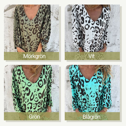 שמלת בוהו מנומרת שזורקת מבט