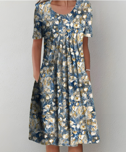 שמלצת פרחים אלמה בלומסטרקוג™ | שמלת קיץ אלגנטית וקלה עם דפוסי פרחים צבעוניים