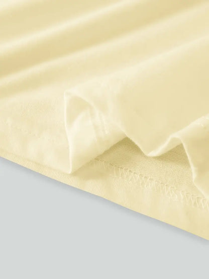 Aimilia - חולצת טי קלה ואלגנטית עם עיטור פרחוני מושך את העין